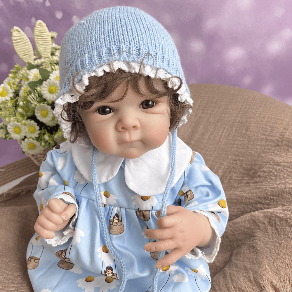 45 cm lebensechte Bettie Reborn-Babypuppe mit kurzem Haar in blauer Kleidung