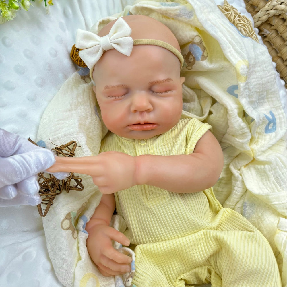 45 cm dehnbare Loulou Reborn Puppe aus Vollsilikon schlafend in gelben Outfits