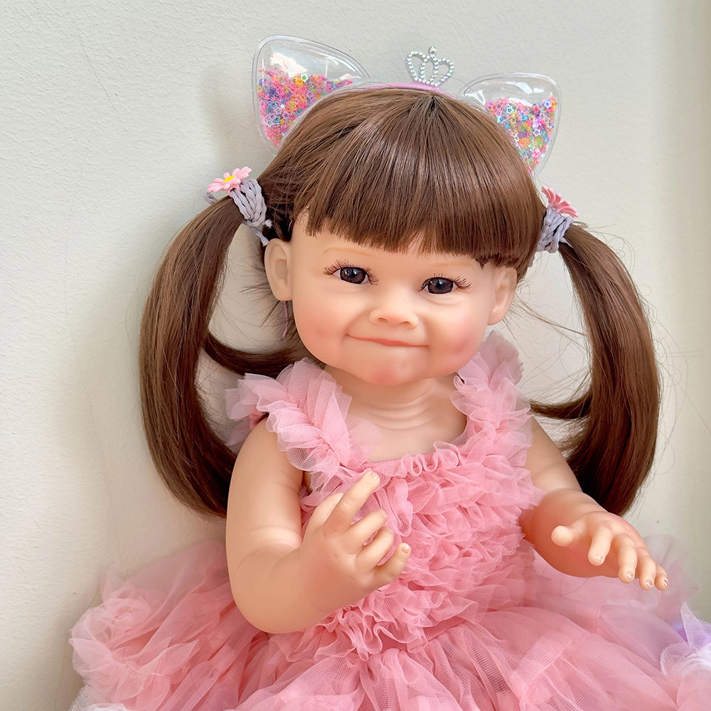 55 cm Raya Reborn-Puppe mit langen Haaren im rosa Kleid