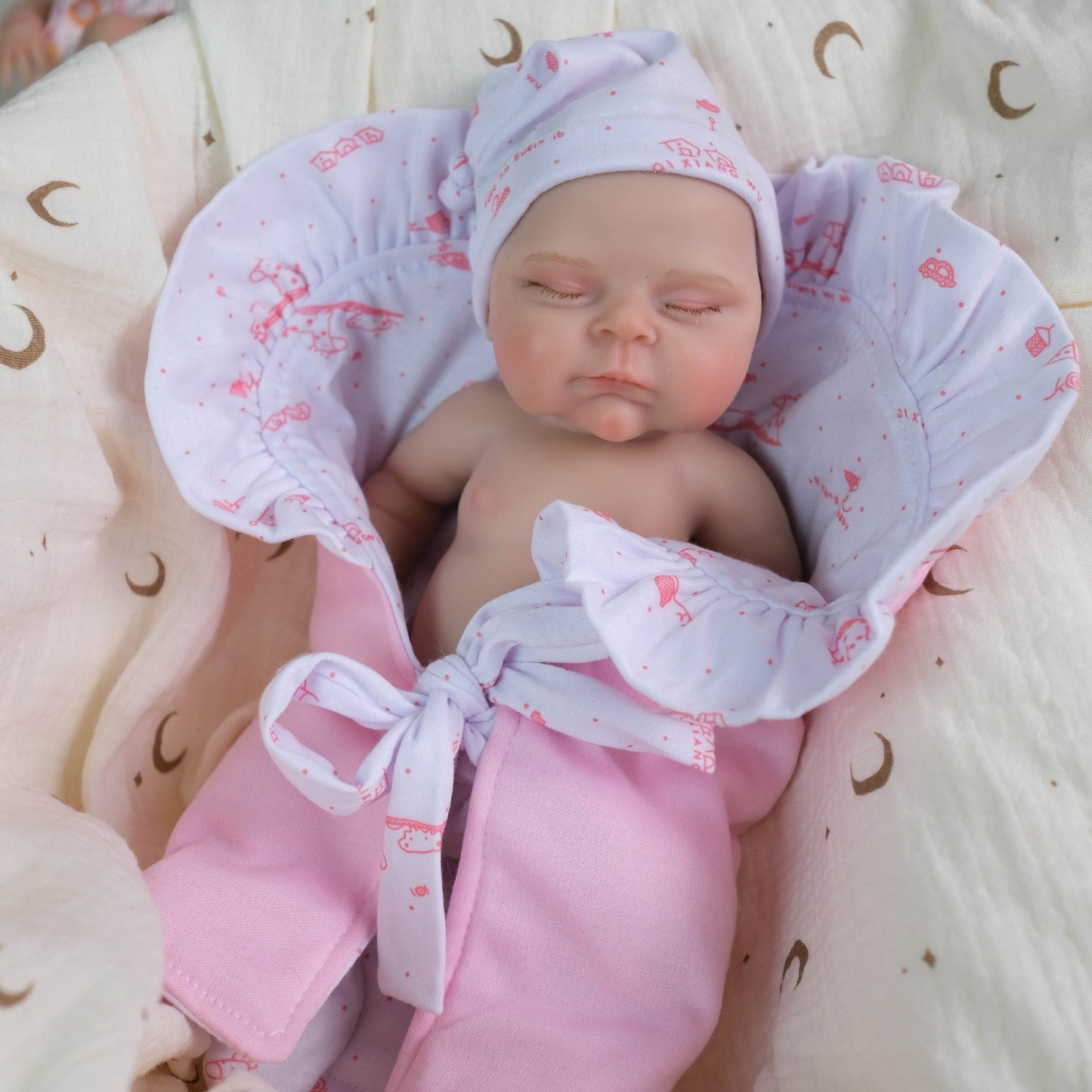 30 cm vollständig aus Silikon gefertigtes pfirsichfarbenes Reborn-Babymädchen mit geschlossenen Augen