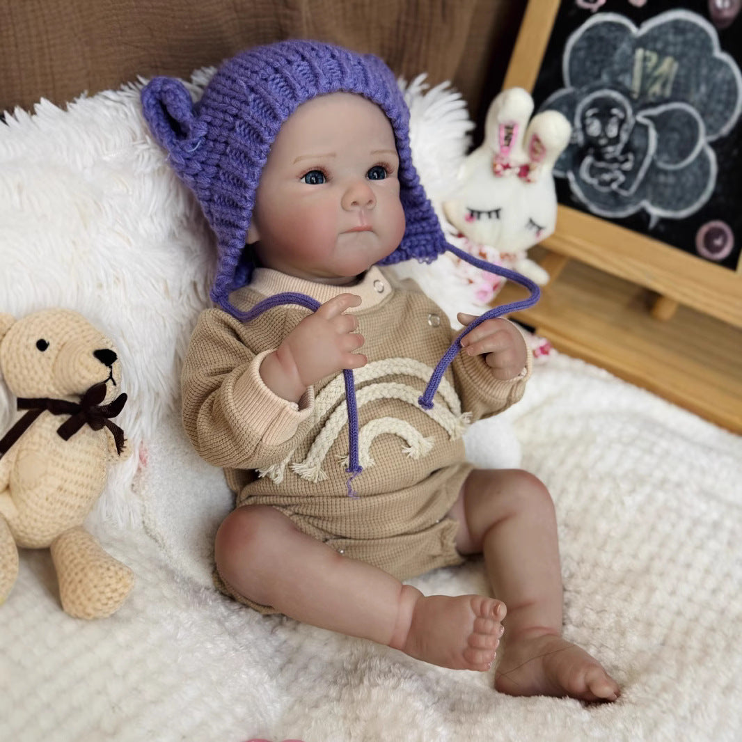 50cm Kelly Blaue Augen Reborn Babypuppe Mädchen in lila Hut-Bettie