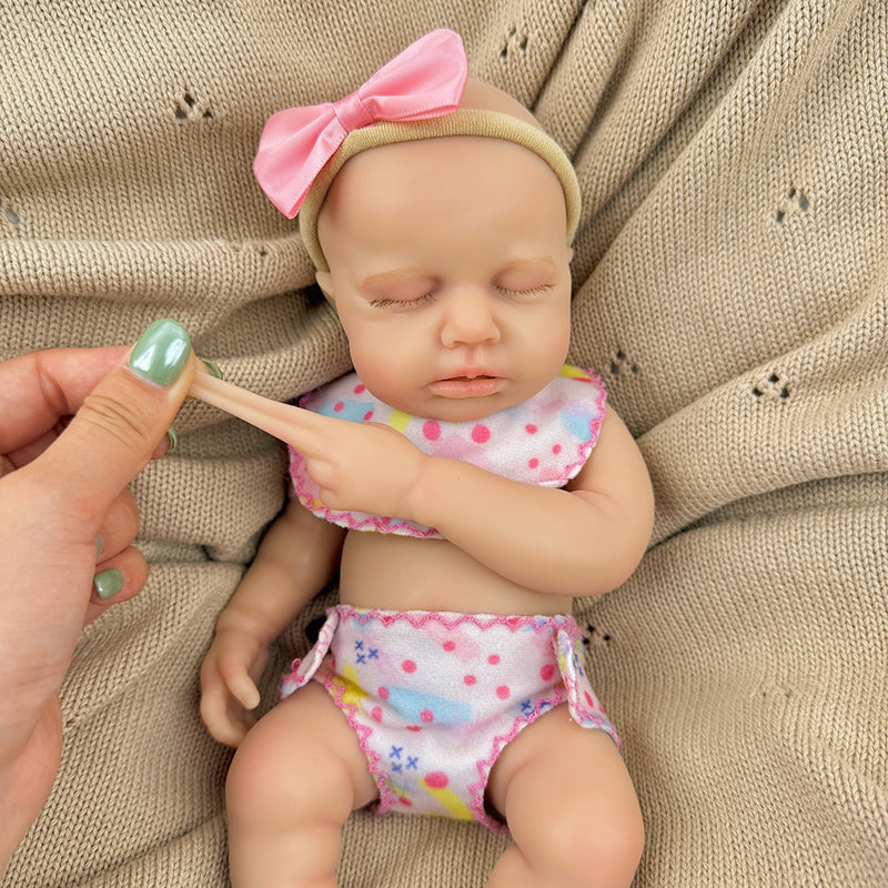 30 cm Loulou-Reborn Baby aus Vollsilikon in rosa Outfits