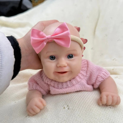 30 cm vollständig aus Silikon gefertigtes Reborn Baby Maddies Lächeln in rosa Outfits