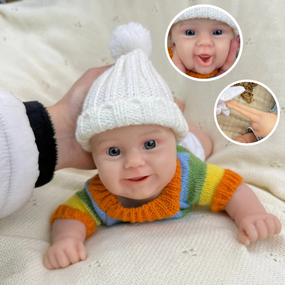 30 cm vollständig aus Silikon gefertigte Reborn Babypuppe Maddie Lächeln mit buntem Streifenpullover