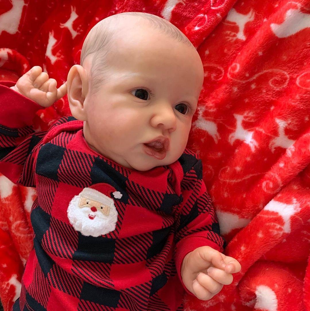 22 Zoll Reborn Puppe Mädchen mit offenen Augen und Weihnachtskleidung - Saskia