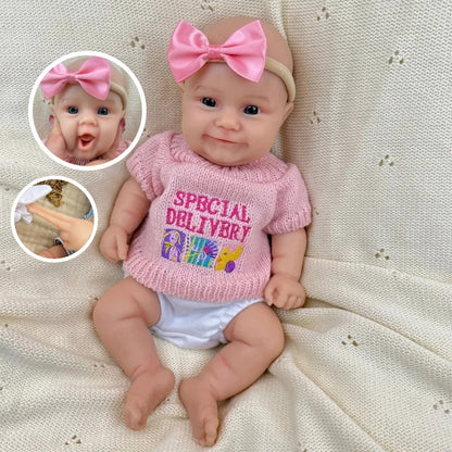 30 cm vollständig aus Silikon gefertigtes Reborn Baby Maddies Lächeln in rosa Outfits