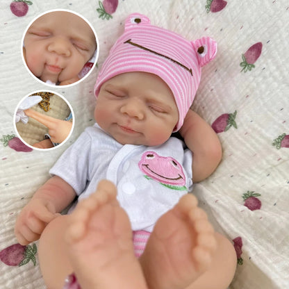 30 cm Pascale Reborn Puppe aus Vollsilikon im rosa Frosch-Outfit