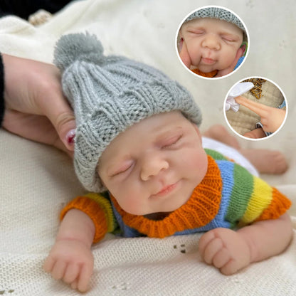 30 cm Pascale Reborn Puppe aus Vollsilikon Mädchen im bunten Streifenpullover