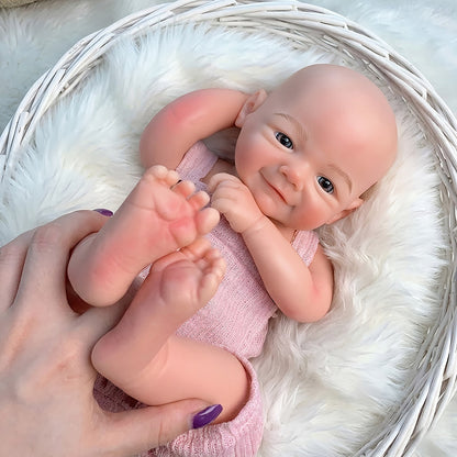 Lebensechte 45cm Reborn Puppe Vivienne (Mädchen) aus Vollsilikon mit Lächeln und rosa Latzhose