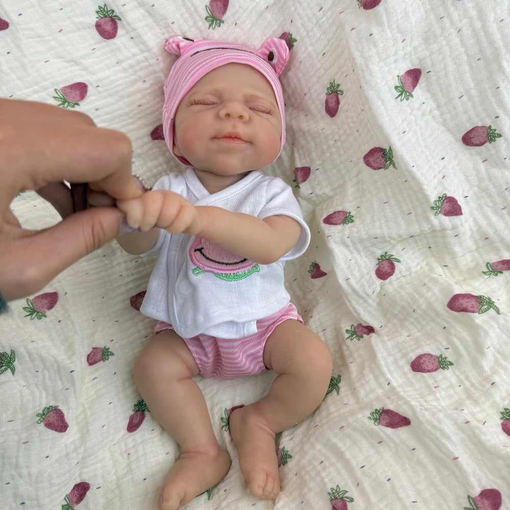 30 cm Pascale Reborn Puppe aus Vollsilikon im rosa Frosch-Outfit