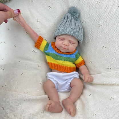 30 cm Pascale Reborn Puppe aus Vollsilikon Mädchen im bunten Streifenpullover