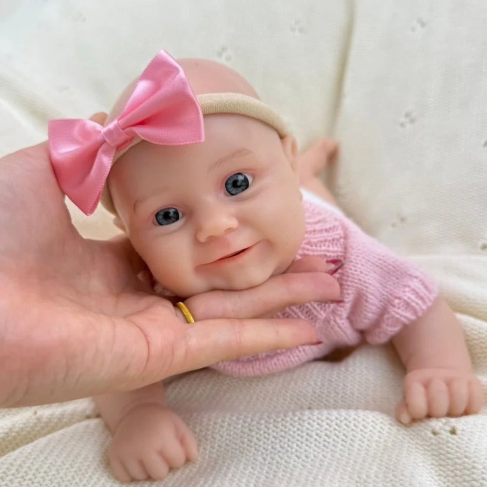 30 cm vollständig aus Silikon gefertigtes Reborn Baby Maddies Lächeln in rosa Outfits