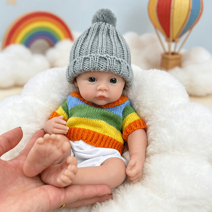 30 cm vollständig aus Silikon gefertigtes Reborn Baby Meadow Mädchen im bunten Streifenpullover