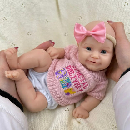 30 cm vollständig aus Silikon gefertigtes Reborn Baby Maddies Lächeln in rosa Outfits