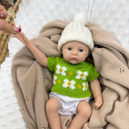 30 cm vollständig aus Silikon gefertigtes Reborn Baby Mädchen mit grünem Blumenpullover