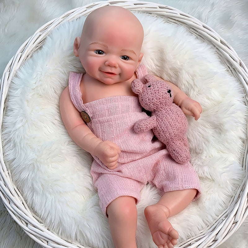 Lebensechte 45cm Reborn Puppe Vivienne (Mädchen) aus Vollsilikon mit Lächeln und rosa Latzhose