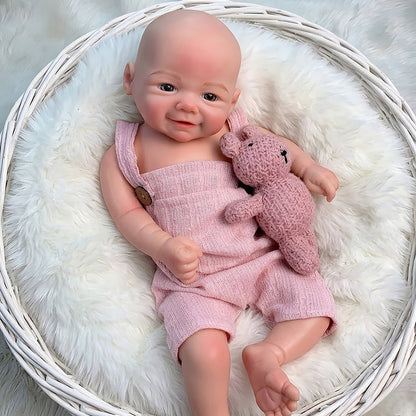 Lebensechte 45cm Reborn Puppe Vivienne (Mädchen) aus Vollsilikon mit Lächeln und rosa Latzhose