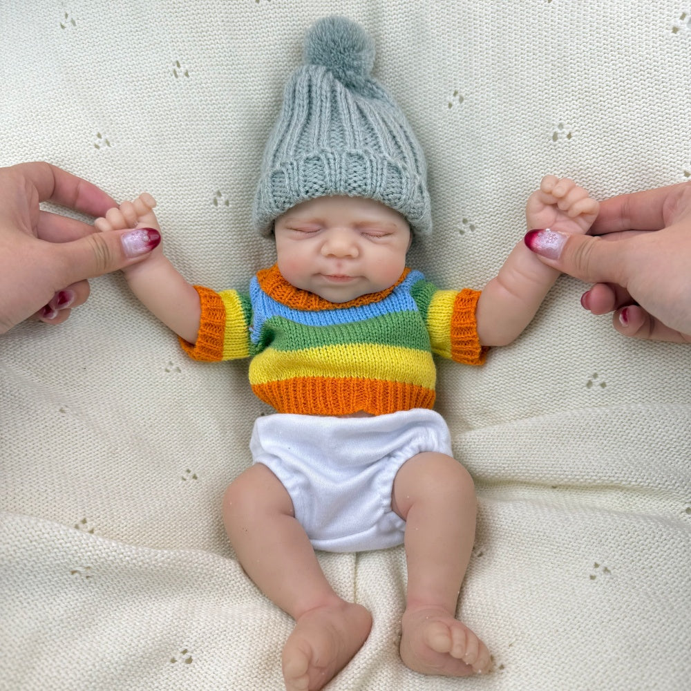 30 cm Pascale Reborn Puppe aus Vollsilikon Mädchen im bunten Streifenpullover