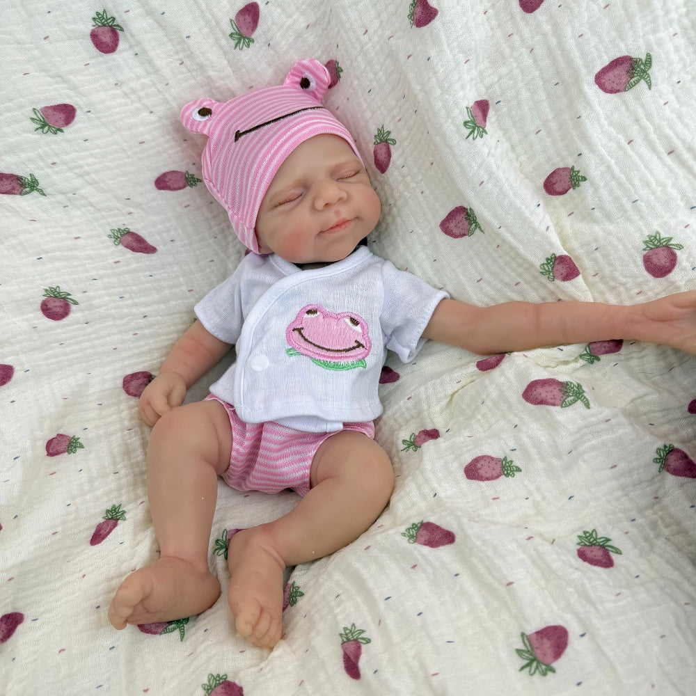 30 cm Pascale Reborn Puppe aus Vollsilikon im rosa Frosch-Outfit