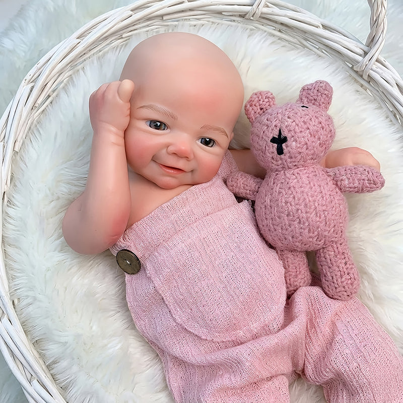 Lebensechte 45cm Reborn Puppe Vivienne (Mädchen) aus Vollsilikon mit Lächeln und rosa Latzhose