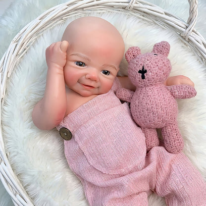 Lebensechte 45cm Reborn Puppe Vivienne (Mädchen) aus Vollsilikon mit Lächeln und rosa Latzhose