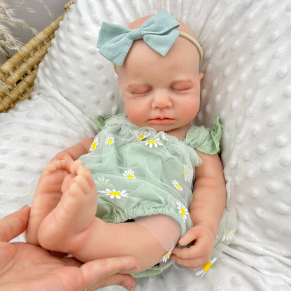 45 cm dehnbares Loulou-Reborn-Mädchen aus Vollsilikon im grünen Gänseblümchen Outfit