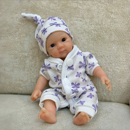 20cm Mini Bettie Reborn Babypuppe aus Silikon mit offenen Augen im lila geblümten Jumpsuit