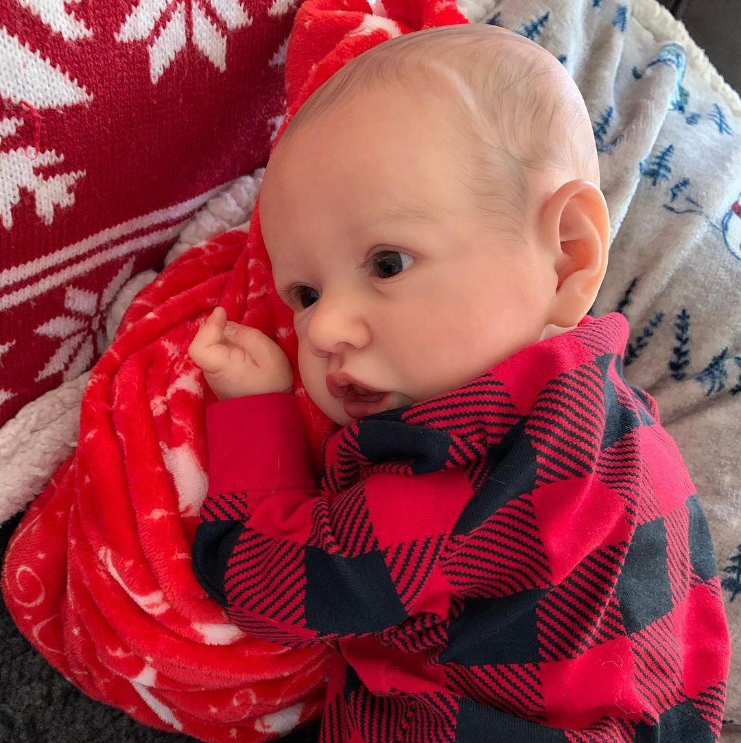 22 Zoll Reborn Puppe Mädchen mit offenen Augen und Weihnachtskleidung - Saskia