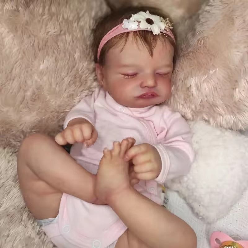 19" lebensechte Reborn-Babypuppe mit geschlossenen Augen in rosa Kleidung - Rosalie