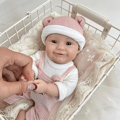 30 cm vollständig aus Silikon gefertigte Reborn-Babypuppe Maddie lächeln im rosa Bärenoutfit