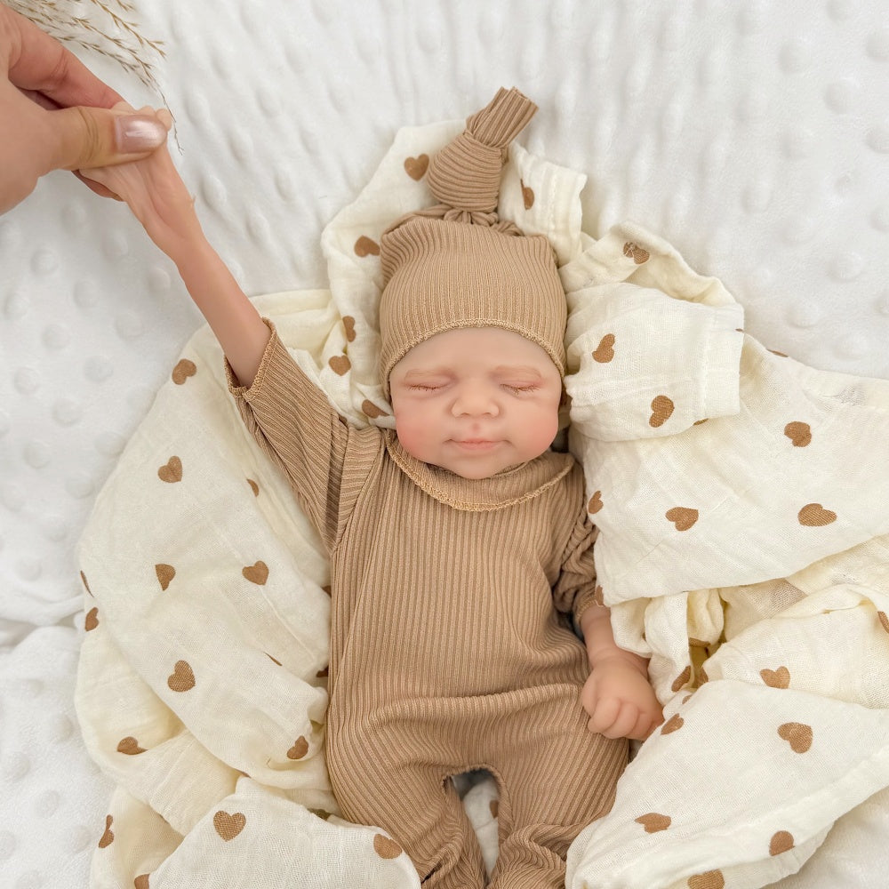30 cm schlafende Pascale Reborn-Puppe aus Vollsilikon in brauner Kleidung