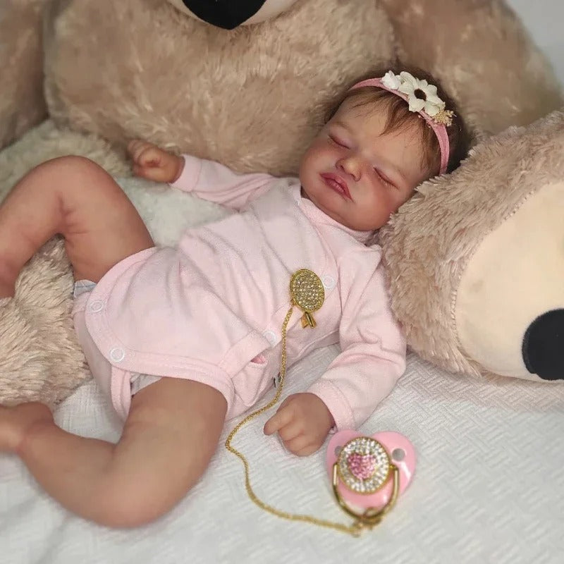 19" lebensechte Reborn-Babypuppe mit geschlossenen Augen in rosa Kleidung - Rosalie