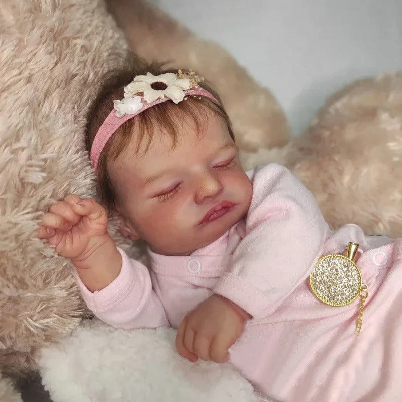 19" lebensechte Reborn-Babypuppe mit geschlossenen Augen in rosa Kleidung - Rosalie