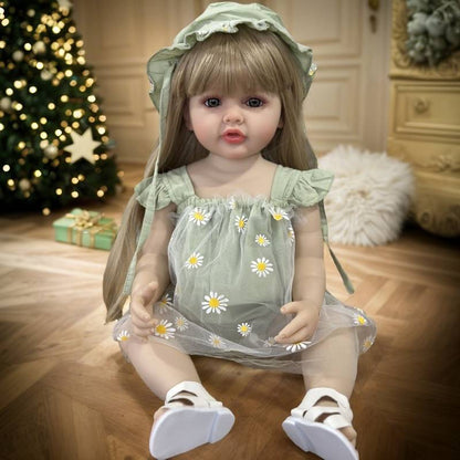 55 cm rebornte Baby-Dame Betty mit offenen Augen und langen blonden Haaren in grünem Gänseblümchen-Outfit