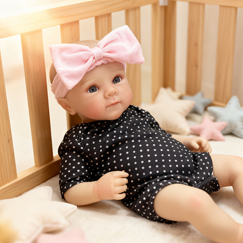 48 cm Bettie Reborn BabypuppeMädchen mit offenen Augen in schwarzer Kleidung mit weißen Punkten