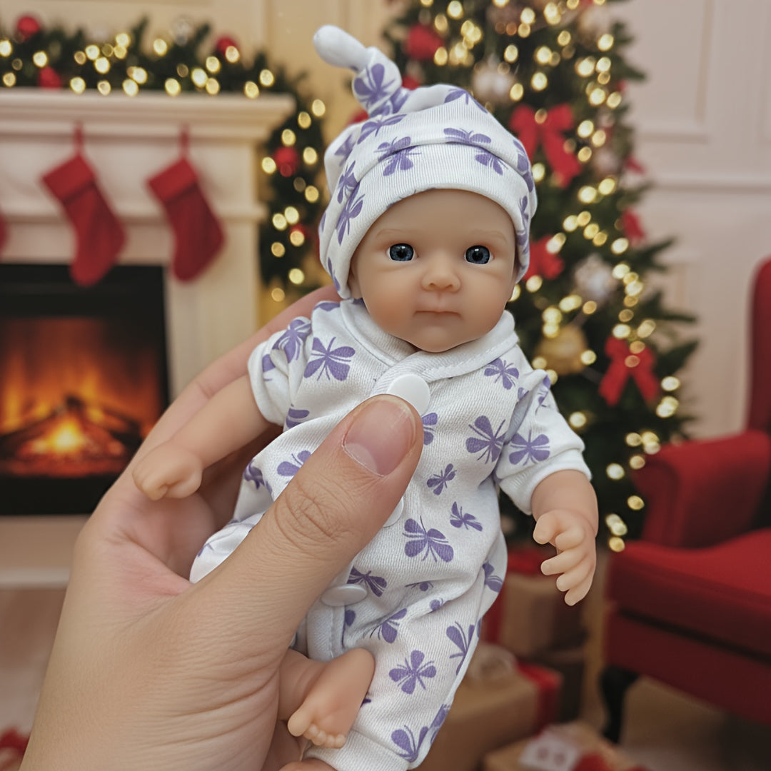 20cm Mini Bettie Reborn Babypuppe aus Silikon mit offenen Augen im lila geblümten Jumpsuit