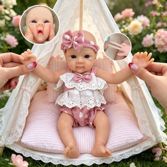 30cm Bettie Reborn Baby Mädchen aus Vollsilikon in rosa gepunktetem Outfit
