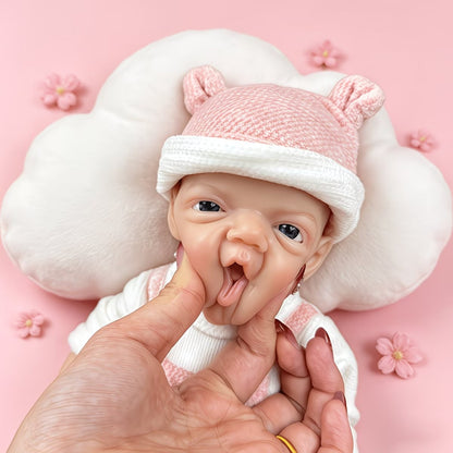 30 cm lebensechte Charlie Reborn-Puppe mit blauen Augen und einem strahlenden Lächeln aus Vollsilikon in rosa Bärenkleidung
