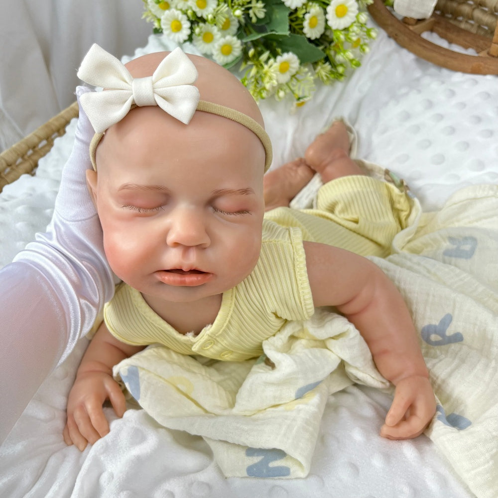 45 cm dehnbare Loulou Reborn Puppe aus Vollsilikon schlafend in gelben Outfits