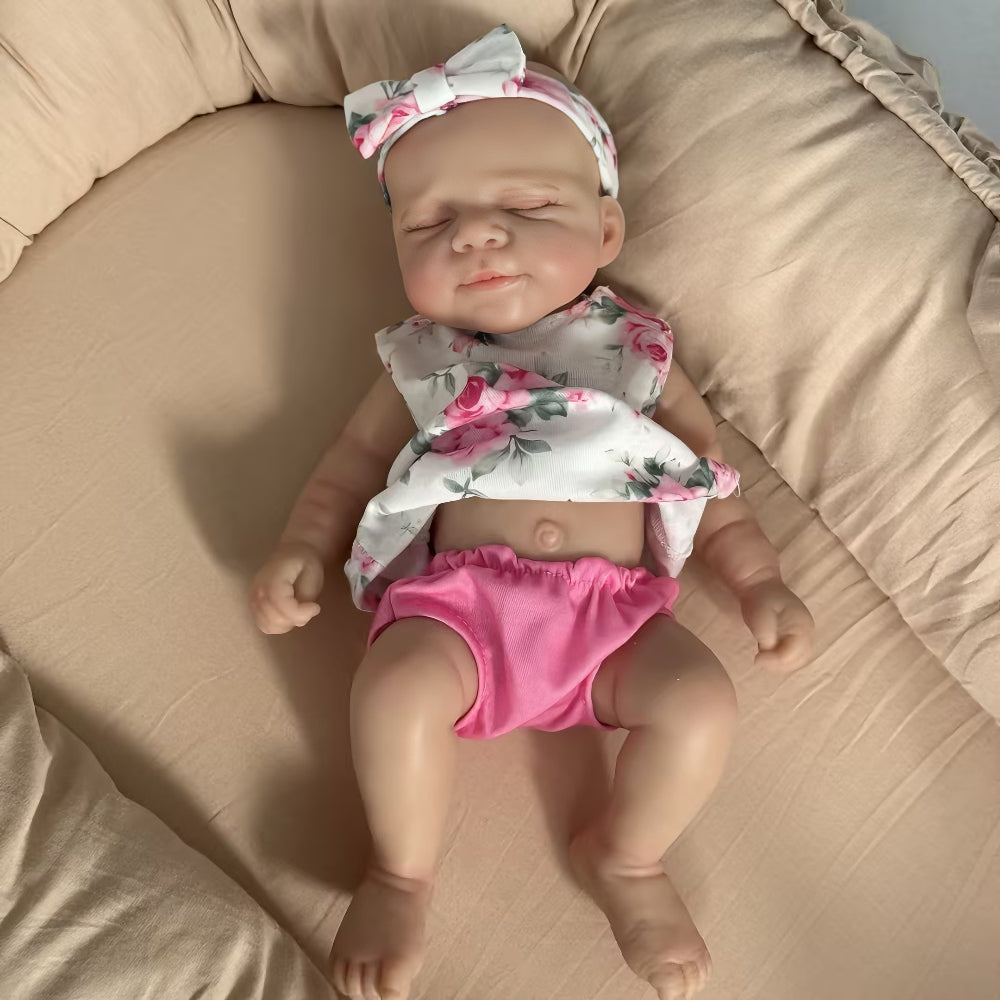 30 cm niedliche Pascale Reborn Puppe aus Vollsilikon in rosa geblümtem Outfit