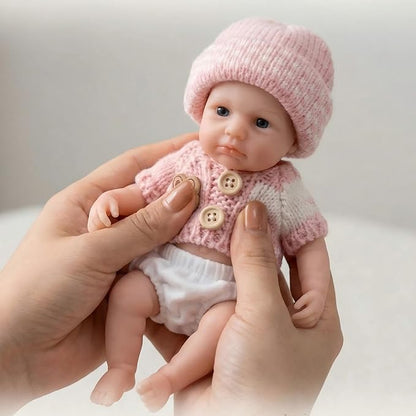 20 cm Loulou Reborn-Babypuppe aus Vollsilikon mit offenen Augen im rosa Pullover