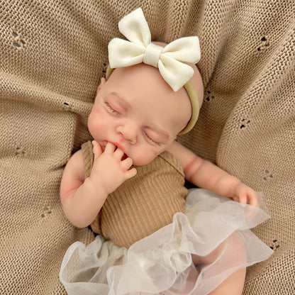 30 cm realistische Irys Reborn Puppe aus Vollsilikon mit geschlossenen Augen im kaffeefarbenen Kleid