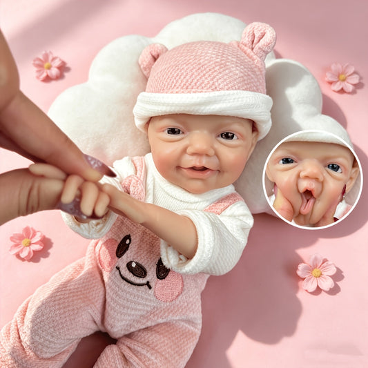 30 cm lebensechte Charlie Reborn-Puppe mit blauen Augen und einem strahlenden Lächeln aus Vollsilikon in rosa Bärenkleidung