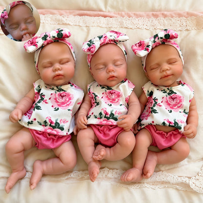 30cm dehnbare Triplets Reborn Puppen aus Vollsilikon mit geschlossenen Augen in Blumenoutfits