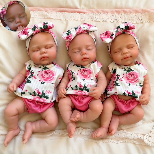 30cm dehnbare Triplets Reborn Puppen aus Vollsilikon mit geschlossenen Augen in Blumenoutfits