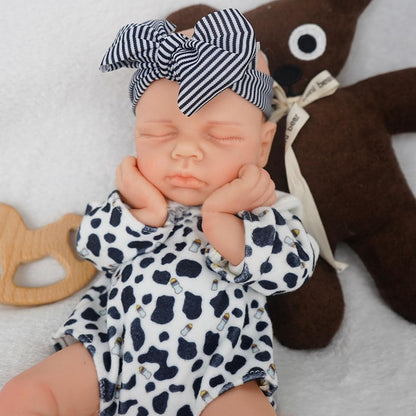 30 cm lebensechte Silikon Reborn Puppe Loulou mit geschlossenen Augen in schwarz-weißer Kleidung
