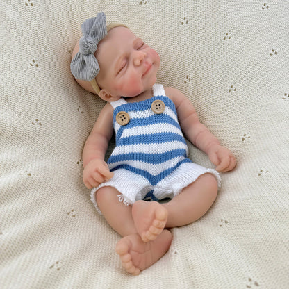 30 cm lebensechte Pascale Reborn Babypuppe aus Vollsilikon mit geschlossenen Augen in blau weiß gestreiftem Outfit