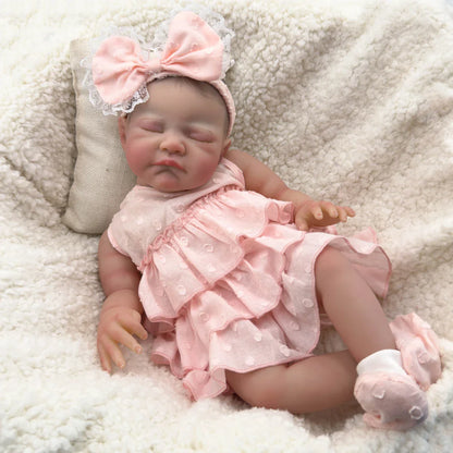 19 Zoll lebensechte Reborn Puppe mit geschlossenen Augen August im rosa Kleid