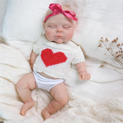 30 cm weiches Silikon-Reborn-Baby-Mädchen mit geschlossenen Augen Pfirsichfarben in weißer Kleidung