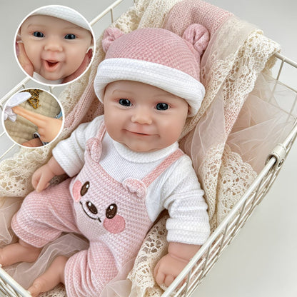 30 cm vollständig aus Silikon gefertigte Reborn-Babypuppe Maddie lächeln im rosa Bärenoutfit
